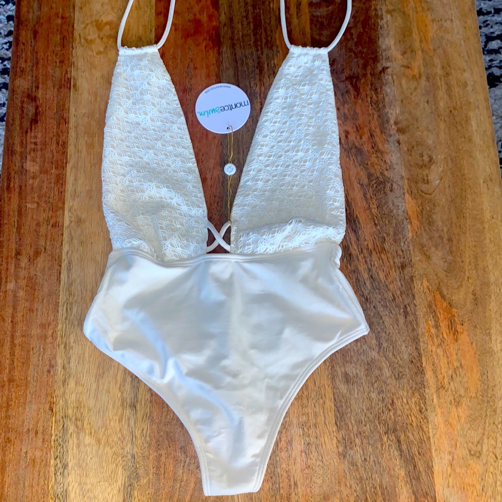 NWT Montce one piece suit. Cream. Size L.